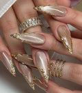 Nude Gold Cat Eye Artwork On Nails With Crystals